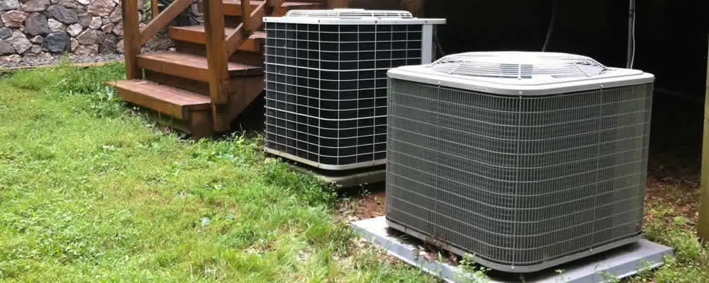 Heat pump installation and service units outside a home in Wilmington, NC